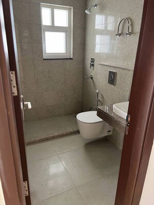 Bathroom in 3 BHK Apartment at Ramprastha Skyz, Sector 37d – for Rent