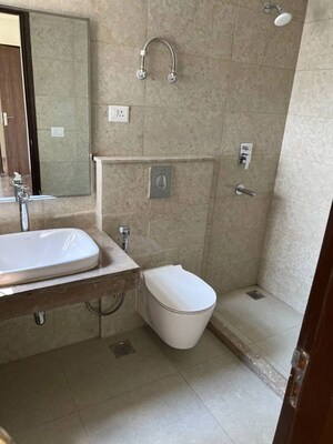 Bathroom in 3 BHK Apartment at Ramprastha Skyz, Sector 37d – for Rent