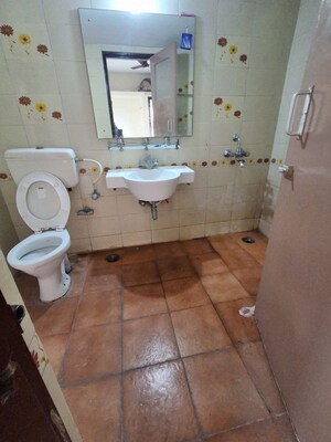 Bathroom in 3 BHK Apartment at AWHO Tucker Enclave, Hadapsar – for Rent