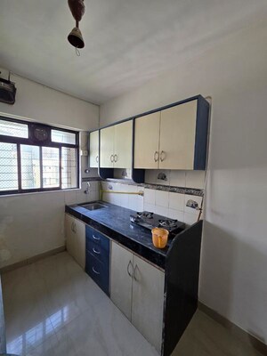 Kitchen in 2 BHK Apartment at Acme Avenue, Kandivali West – for Sale