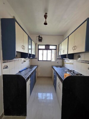 Kitchen in 2 BHK Apartment at Acme Avenue, Kandivali West – for Sale