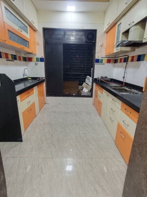 Kitchen in 2 BHK Apartment at Trishul Patel Heights, Ghansoli – for Rent