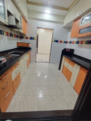 Kitchen in 2 BHK Apartment at Trishul Patel Heights, Ghansoli – for Rent