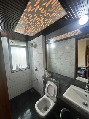 Bathroom in 2 BHK Apartment at Puranik City, Kasarvadavali – for Rent