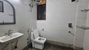 Bathroom in 2 BHK Builder Floor at Freedom Fighters Enclave – for Rent