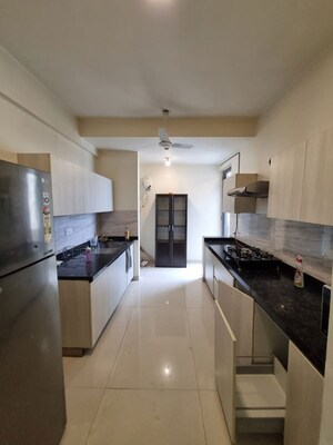 Kitchen in 4 BHK Apartment at Rustomjee Paramount, Khar West – for Sale