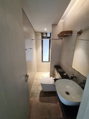 Bathroom in 4 BHK Apartment at Rustomjee Paramount, Khar West – for Sale
