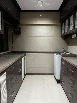 Kitchen in 2 BHK Apartment at Runwal Eirene, Balkum Pada – for Rent