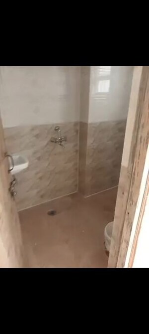 Bathroom in 2 BHK Apartment at Javin Raj Empire, Raj Nagar Extension – for Rent