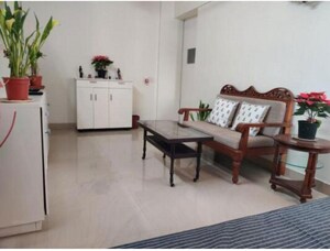 Living Room in 1 BHK Apartment at Juhu – for Rent