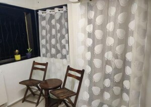 Living Room in 1 BHK Apartment at Juhu – for Rent