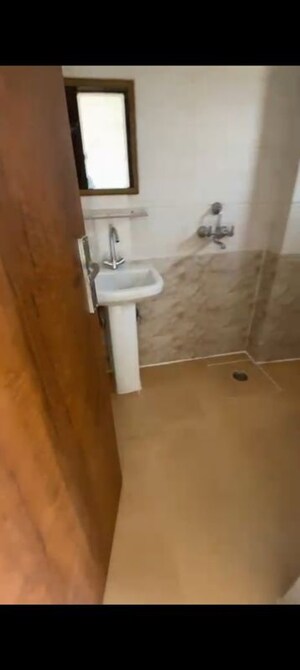 Bathroom in 2 BHK Apartment at Javin Raj Empire, Raj Nagar Extension – for Rent