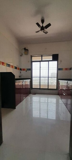 Kitchen in 2 BHK Apartment at Trishul Patel Heights, Ghansoli – for Rent