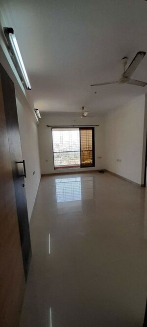 Living Room in 2 BHK Apartment at Trishul Patel Heights, Ghansoli – for Rent