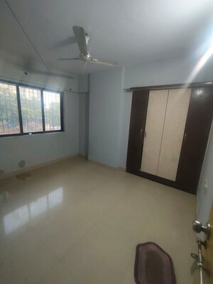 Master Bedroom in 2 BHK Apartment at Ram Pushpanjali Residency, Owale – for Rent