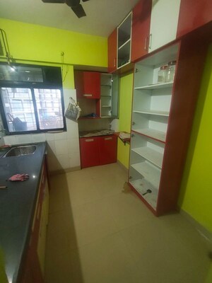 Kitchen in 2 BHK Apartment at Ram Pushpanjali Residency, Owale – for Rent