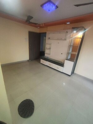 Living Room in 2 BHK Apartment at Ram Pushpanjali Residency, Owale – for Rent