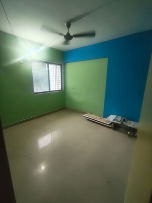 Master Bedroom in 2 BHK Apartment at Ram Pushpanjali Residency, Owale – for Rent