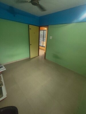 Master Bedroom in 2 BHK Apartment at Ram Pushpanjali Residency, Owale – for Rent