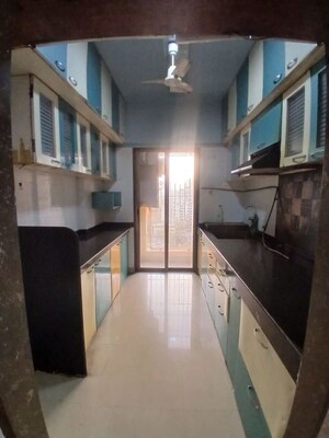 Kitchen in 2 BHK Apartment at Madhav Palacia, Ghodbunder Road – for Rent