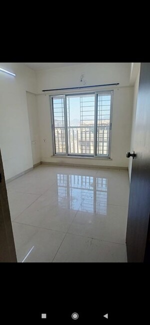 Room in 2 BHK Apartment at Unique Poonam Estate Cluster 3, Mira Road – for Rent