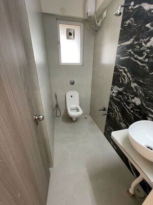 Bathroom in 2 BHK Apartment at Unique Ivana, Mira Road – for Sale