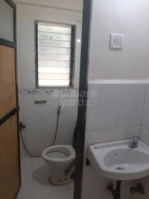 Bathroom in 1 BHK Apartment at Mahavir Sargam CHS, Ghansoli – for Rent