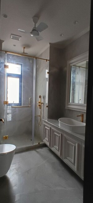 Bathroom in 3 BHK Builder Floor at Defence Colony – for Rent