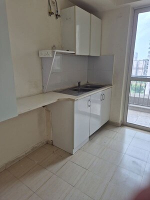 Kitchen in 3 BHK Apartment at DLF Regal Gardens, Sector 90 – for Rent