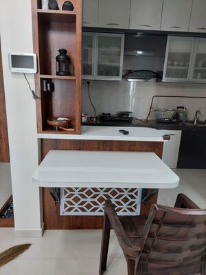 Kitchen in 2 BHK Apartment at Duville Riverdale Heights, Kharadi – for Rent