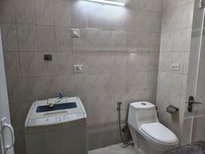 Bathroom in 2 BHK Builder Floor at Defence Colony – for Rent