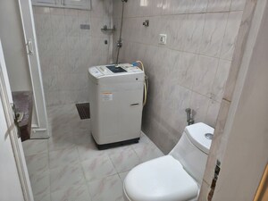 Bathroom in 2 BHK Builder Floor at Defence Colony – for Rent