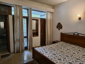 Bedroom in 2 BHK Builder Floor at Defence Colony – for Rent