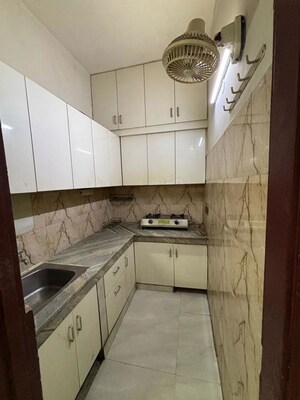 Kitchen in 2 BHK Builder Floor at Lajpat Nagar – for Rent