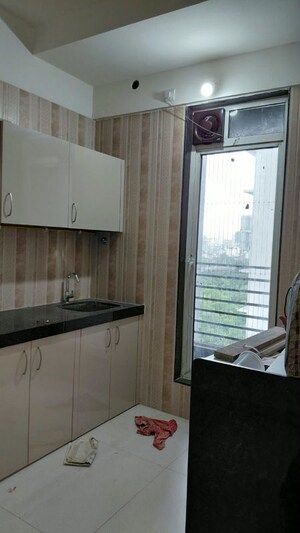 Kitchen in 2 BHK Apartment at Sheth Zuri, Laxmi Nagar – for Rent