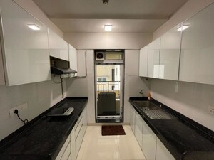 Kitchen in 2 BHK Apartment at Rustomjee Urbania Azziano, Thane West – for Rent