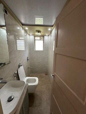 Bathroom in 2 BHK Apartment at Awadhoot CHS, Andheri West – for Rent