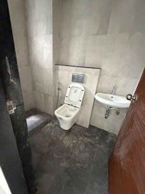 Bathroom in 2 BHK Apartment at Guruganesh Nagar – for Sale