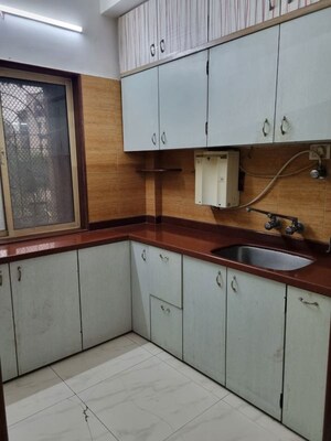 Kitchen in 2 BHK Apartment at Vijay Vishal CHS, Anand Nagar – for Rent