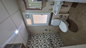 Bathroom in 2 BHK Apartment at Brigade Bricklane, Jakkuru – for Rent