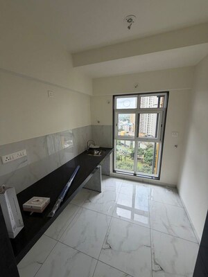 Kitchen in 1 BHK Apartment at MICL Aaradhya Parkwood, Mira Road – for Rent