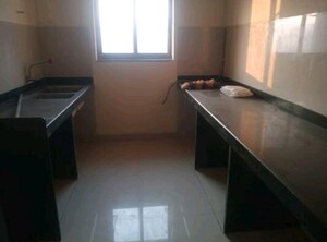 Kitchen in 1.5 BHK Apartment at Lodha Casa Royale, Balkum Pada – for Rent