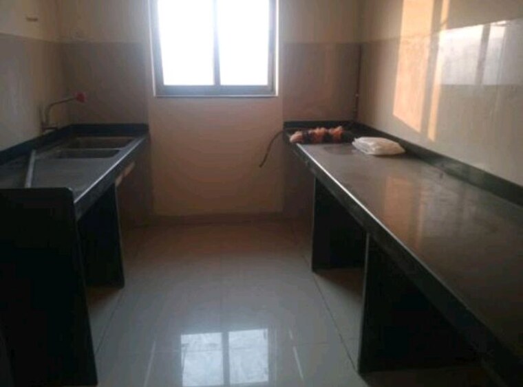 Kitchen, lodha-casa-royale 1.5 Bedroom 560 Sq.Ft. Apartment In Balkum Pada Thane 10641666