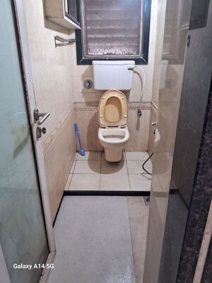 Bathroom in 2 BHK Apartment at Radhika CHS Kopar Khairane, Kopar Khairane – for Rent