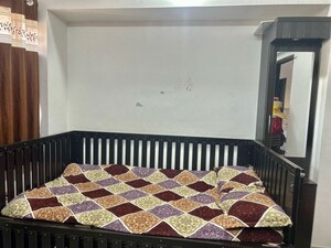 Bedroom in 2 BHK Apartment at Satyam Serenity, Wadgaon Sheri – for Rent