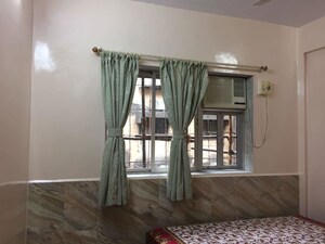 Living Room in 1 BHK Apartment at Nalanda CHS Malad West, Malad West – for Rent