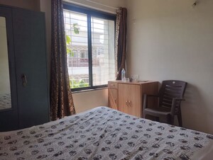 Bedroom in 2 BHK Apartment at Kolte Patil Little Earth, Kiwale – for Rent