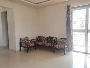 Living Room in 2 BHK Apartment at Kolte Patil Little Earth, Kiwale – for Rent