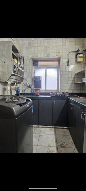 Kitchen in 2 BHK Apartment at Neel Sagar Vile Parle West, Vile Parle West – for Rent
