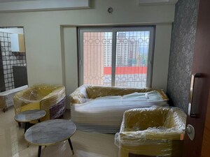 Living Room in 2 BHK Apartment at Paradise Lifespaces Sai World City, New Panvel – for Rent